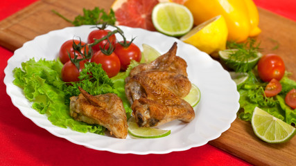 Roast chicken with salad and tomatoes