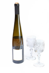 Bottle of wine with two glasses isolated in white