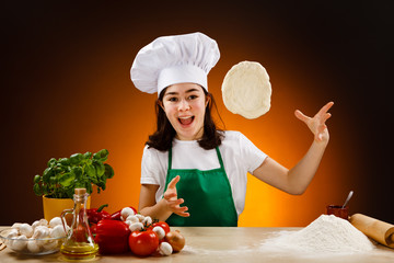 Girl making pizza dough