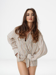 Fototapeta premium fashion pose beautiful woman wearing man's shirt