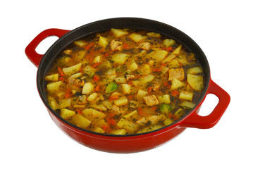 Big red saucepan with hot ragout