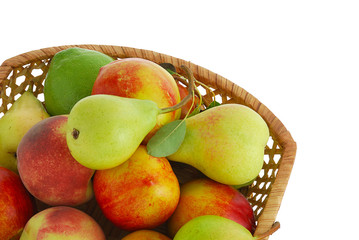 Cropped closeup of  decorative interwoven basket with fresh frui