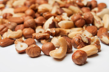 Nuts over white background