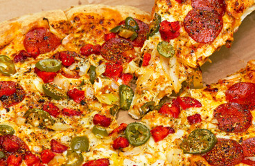 Pepperoni pizza with chicken and jalapeno chilli peppers