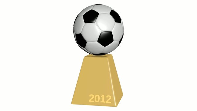 Fußball drehend auf goldenem Sockel 2012