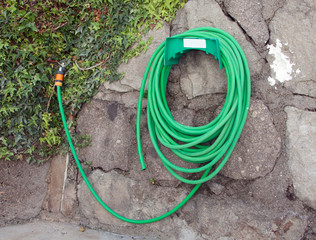 Garden water hose with tap