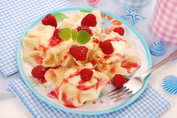 ravioli (pierogi) with cottage cheese and raspberry