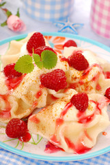 ravioli (pierogi) with cottage cheese and raspberry