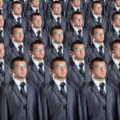 Many identical businessmen clones