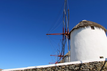 Obraz premium Windmills of sunny Mykonos (Greece, Cyclades)
