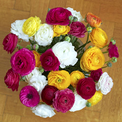 colorful buttercups bouquet, natural background