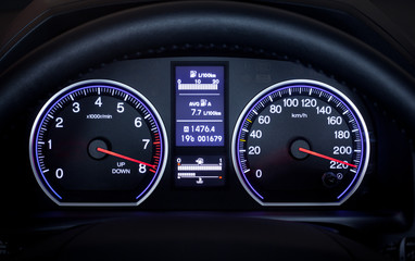 Illuminated car dashboard.