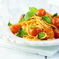 Rustic spaghetti with cherry tomatoes and broccoli