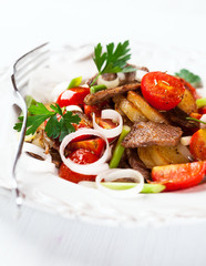 Pan-cooked potatoes with meat and onions (Tyrol)