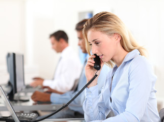 Office worker answering the phone