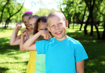 Children playing in the summer park