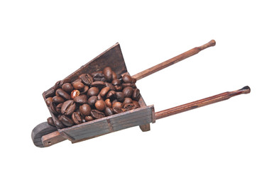 miniature model of the wheelbarrow with filled coffee beans