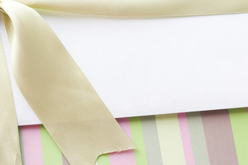 Blank envelope on the gift box