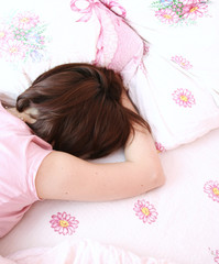 Obraz na płótnie Canvas Young woman sleeping.