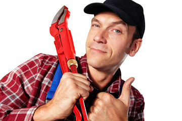 plumber with casing tongs and thumb up
