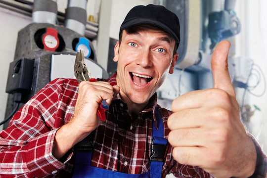 plumber with multigrip pliers and thumb up