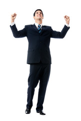 Very happy successful gesturing businessman