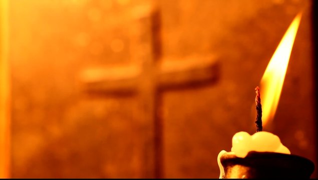 Holy cross with Candle