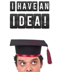 Young person looking at idea type of sign