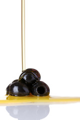 olive oil and olives isolated on white
