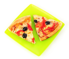 Pizza with olives and tomatoes closeup on green plate