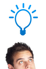 Young person looking at idea type of sign