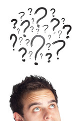 Young head looking at white marks