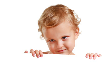 Little cute boy holding a white blank