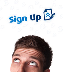 Young head looking at internet type of icons