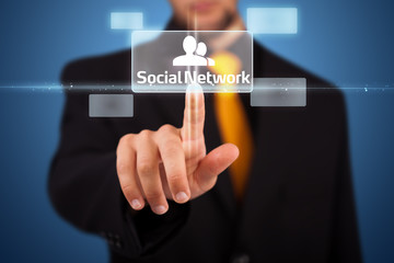Businessman pressing modern social type of icons