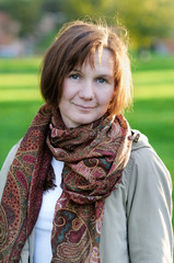 Beautiful autumn woman smiling