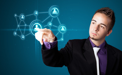 Businessman pressing modern social type of icons