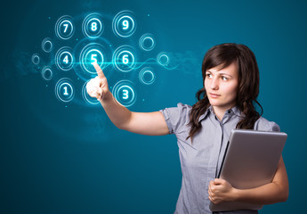 Businesswoman pressing high tech type of modern buttons