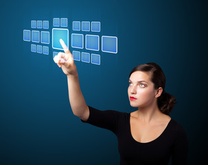 Businesswoman pressing high tech type of modern buttons