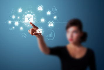 Businesswoman pressing modern business type of buttons