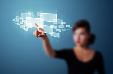 Businesswoman pressing high tech type of modern buttons