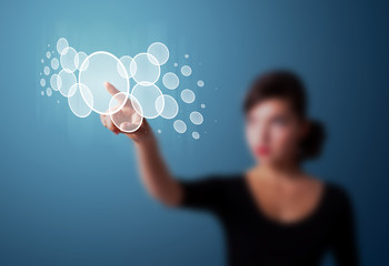 Businesswoman pressing high tech type of modern buttons