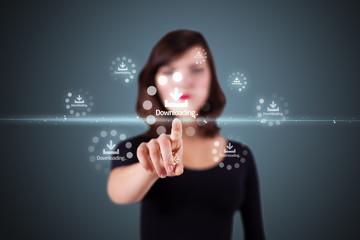 Obraz premium Businesswoman pressing high tech type of modern buttons