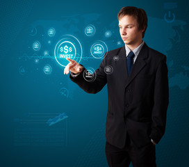 Businessman pressing modern business type of buttons