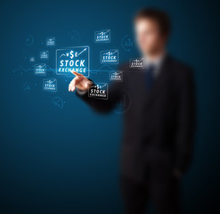 Businessman pressing modern business type of buttons