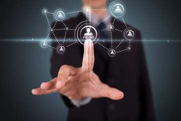 Businessman pressing modern social type of icons