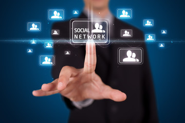 Businessman pressing modern social type of icons
