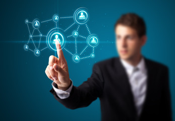 Businessman pressing modern social type of icons