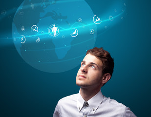 Businessman pressing modern social type of icons