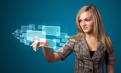 Businesswoman pressing high tech type of modern buttons